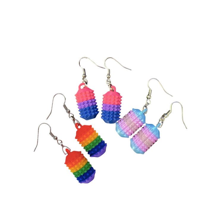 Little Ouchies Grippie Earrings, Little Ouchies Grippie Earrings designed for pain stims, Little Ouchies Grippie Earrings for anxiety and stress, Little Ouchies for sensory regulation, Little Ouchies for self-soothing, pain stim,, autism fidgets for adults, discrete fidget toys, small fidgets, wearable fidget, wearable fidget for adults, Pride earrings, Pride sensory earrings, pride sensory tools, pride fidgets, 
