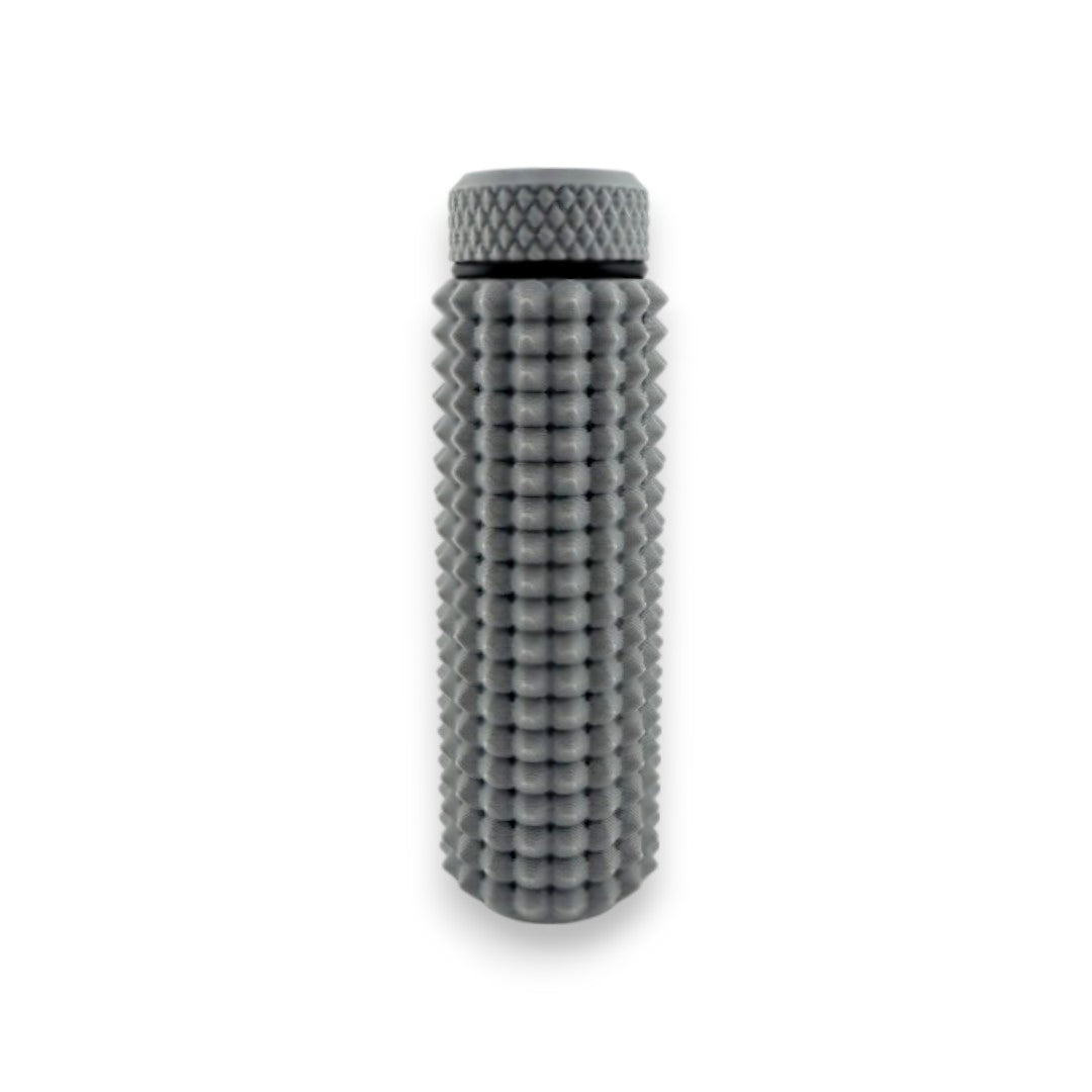 Little Ouchies Grippie Chapstick Holder shown in gray, Little Ouchies Grippie Chapstick Holders are designed for pain stims, Little Ouchies Grippie Chapstick Holder for anxiety and stress, Little Ouchies for sensory regulation, Little Ouchies for self-soothing, pain stim accessories, autism fidgets for adults, discrete fidget toys, small fidgets 

