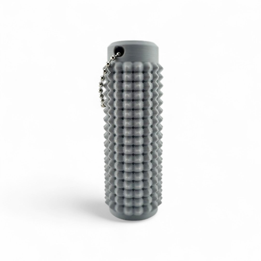 Little Ouchies Grippies shown in gray, Little Ouchies Grippies are designed for pain stims, Little Ouchies Grippies for anxiety and stress, Little Ouchies for sensory regulation, Little Ouchies for self-soothing, pain stim toys for kids, autism fidgets for adults, discrete fidget toys 