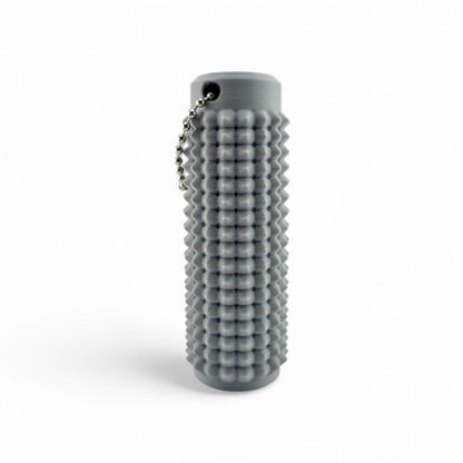 Little Ouchies Grippies shown in gray, Little Ouchies Grippies are designed for pain stims, Little Ouchies Grippies for anxiety and stress, Little Ouchies for sensory regulation, Little Ouchies for self-soothing, pain stim toys for kids, autism fidgets for adults, discrete fidget toys 