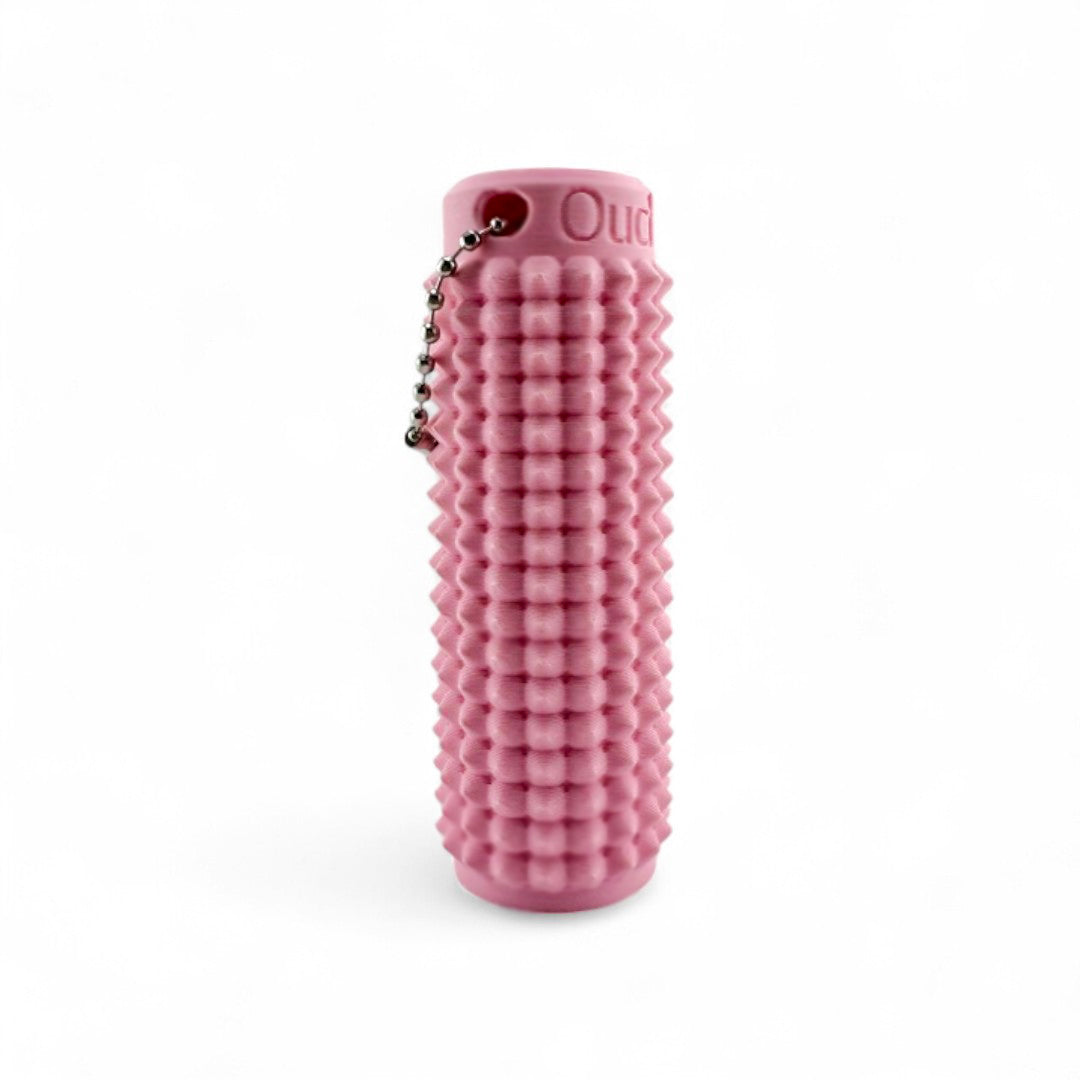 Little Ouchies Grippies shown in pink, Little Ouchies Grippies are designed for pain stims, Little Ouchies Grippies for anxiety and stress, Little Ouchies for sensory regulation, Little Ouchies for self-soothing, pain stim toys for kids, autism fidgets for adults, discrete fidget toys 