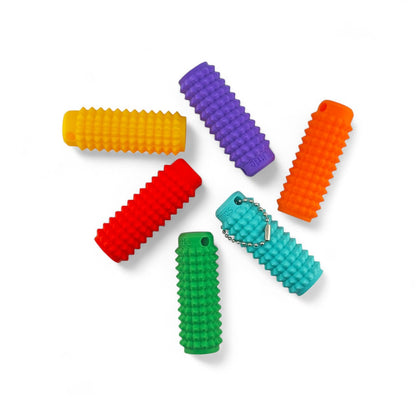 Little Ouchies Mini Grippies shown in many colors, Little Ouchies Mini Grippies are designed for pain stims, Little Ouchies Mini Grippies for anxiety and stress, Little Ouchies for sensory regulation, Little Ouchies for self-soothing, pain stim toys for kids, autism fidgets for adults, discrete fidget toys, small fidgets 