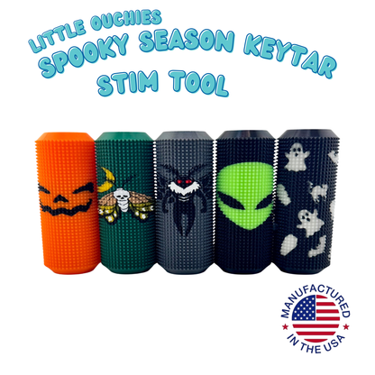 The Little Ouchies Spooky Season Keytar collection shown together, Halloween sensory fidgets with four keyboard-style clicking keys