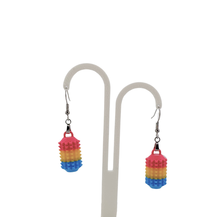 Little Ouchies Grippie Earrings, Little Ouchies Grippie Earrings designed for pain stims, Little Ouchies Grippie Earrings for anxiety and stress, Little Ouchies for sensory regulation, Little Ouchies for self-soothing, pain stim,, autism fidgets for adults, discrete fidget toys, small fidgets, wearable fidget, wearable fidget for adults, Pride earrings, Pride sensory earrings, pride sensory tools, pride fidgets, 

