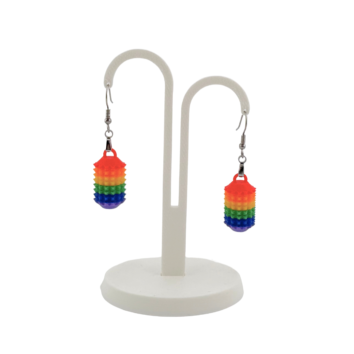 Little Ouchies Grippie Earrings, Little Ouchies Grippie Earrings designed for pain stims, Little Ouchies Grippie Earrings for anxiety and stress, Little Ouchies for sensory regulation, Little Ouchies for self-soothing, pain stim,, autism fidgets for adults, discrete fidget toys, small fidgets, wearable fidget, wearable fidget for adults, Pride earrings, Pride sensory earrings, pride sensory tools, pride fidgets, 
